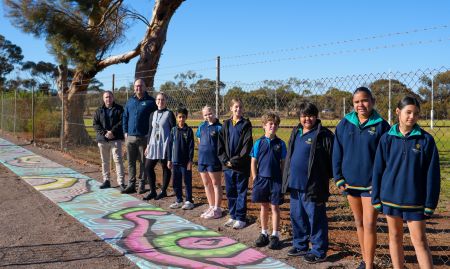 Students with artwork