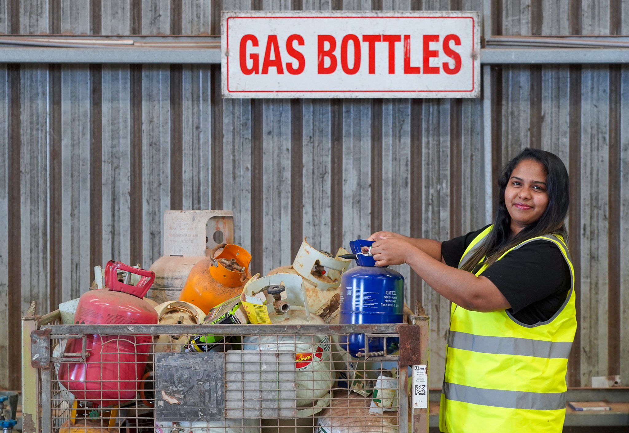 Gas bottles at waste station